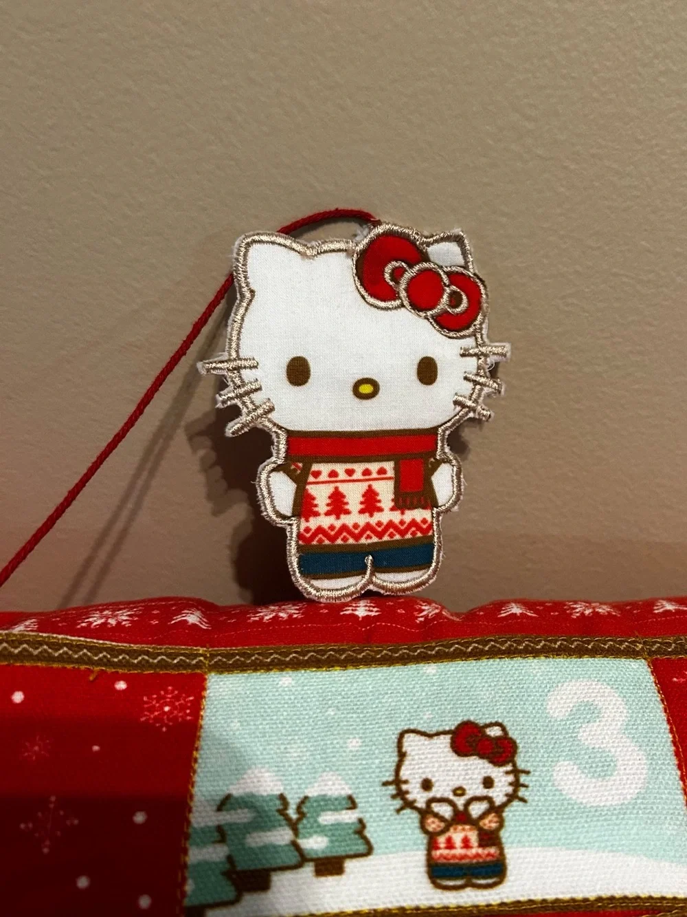 Hello Kitty Red Advent Holiday Pillow with Numbered Pockets & Kitty Date Marker
